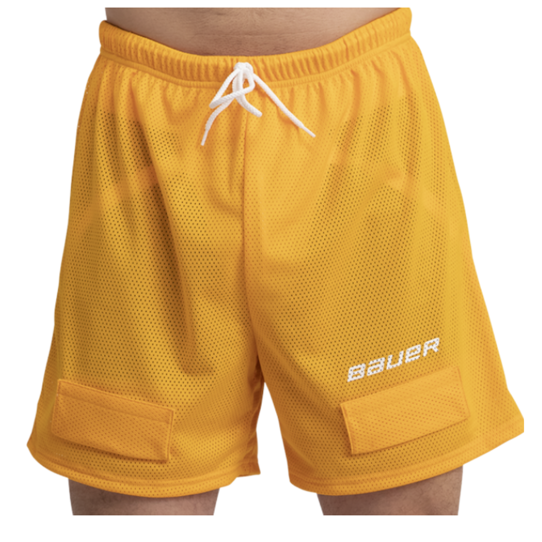 This is a torso of a man wearing yellow mesh jock shorts made by Bauer.